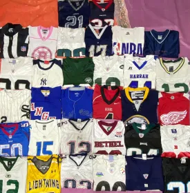 NFL, NHL, and NBA Jerseys - 38 Pieces