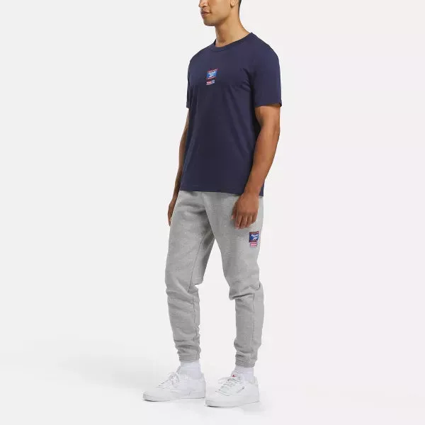 REEBOK MEN'S IDENTITY BADGE NAVY TEE